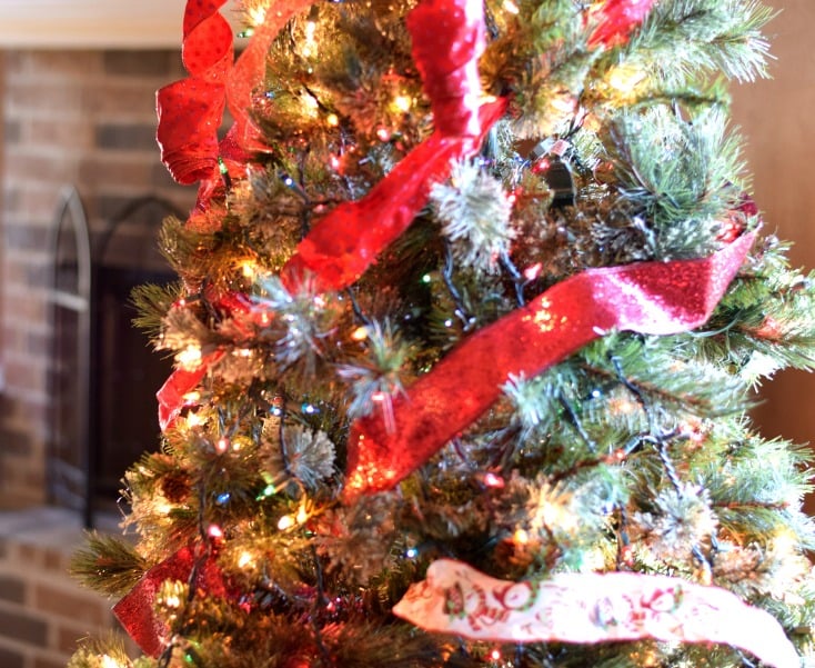 Christmas tree decorating! Use random ribbons to add texture and glam to a smaller tree on chemistrycachet.com