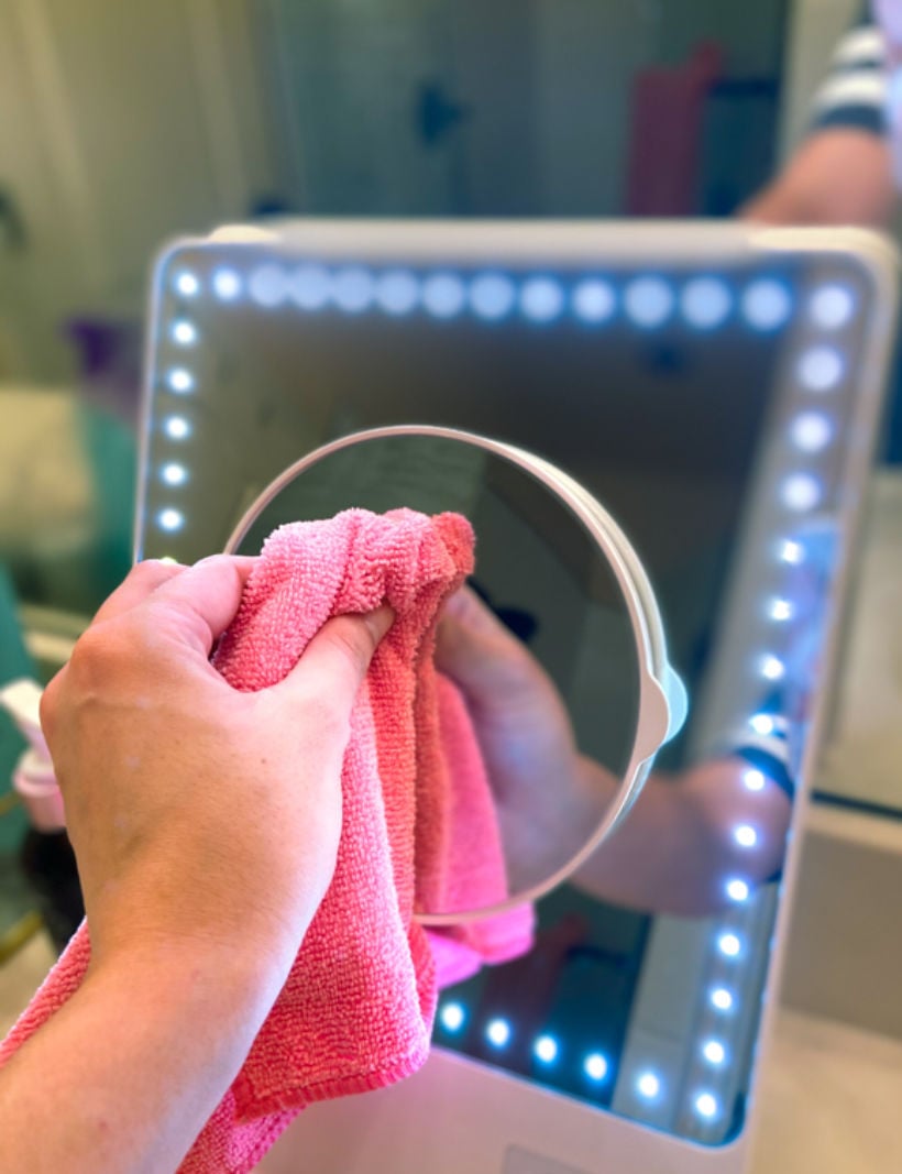 the easiest way to clean a bathroom mirror with one tool on Chemistry Cachet