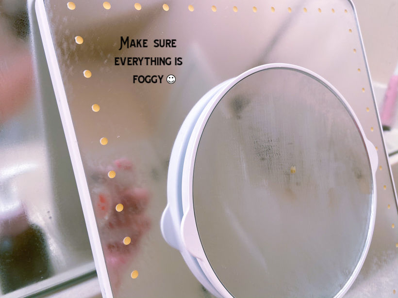 the easiest way to clean a bathroom mirror with one tool