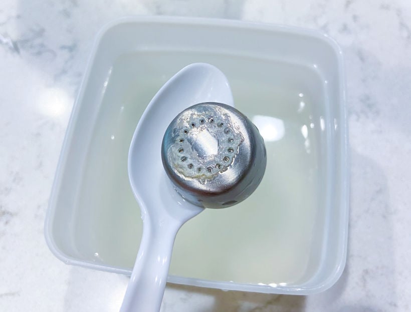 5 minutes in with hard water deposit remover