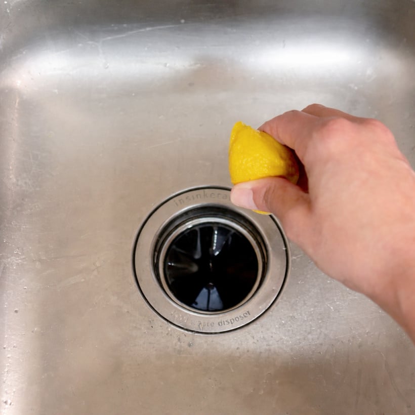scrub the sink with lemon