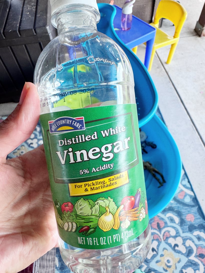 cleaning a kid's water table with vinegar